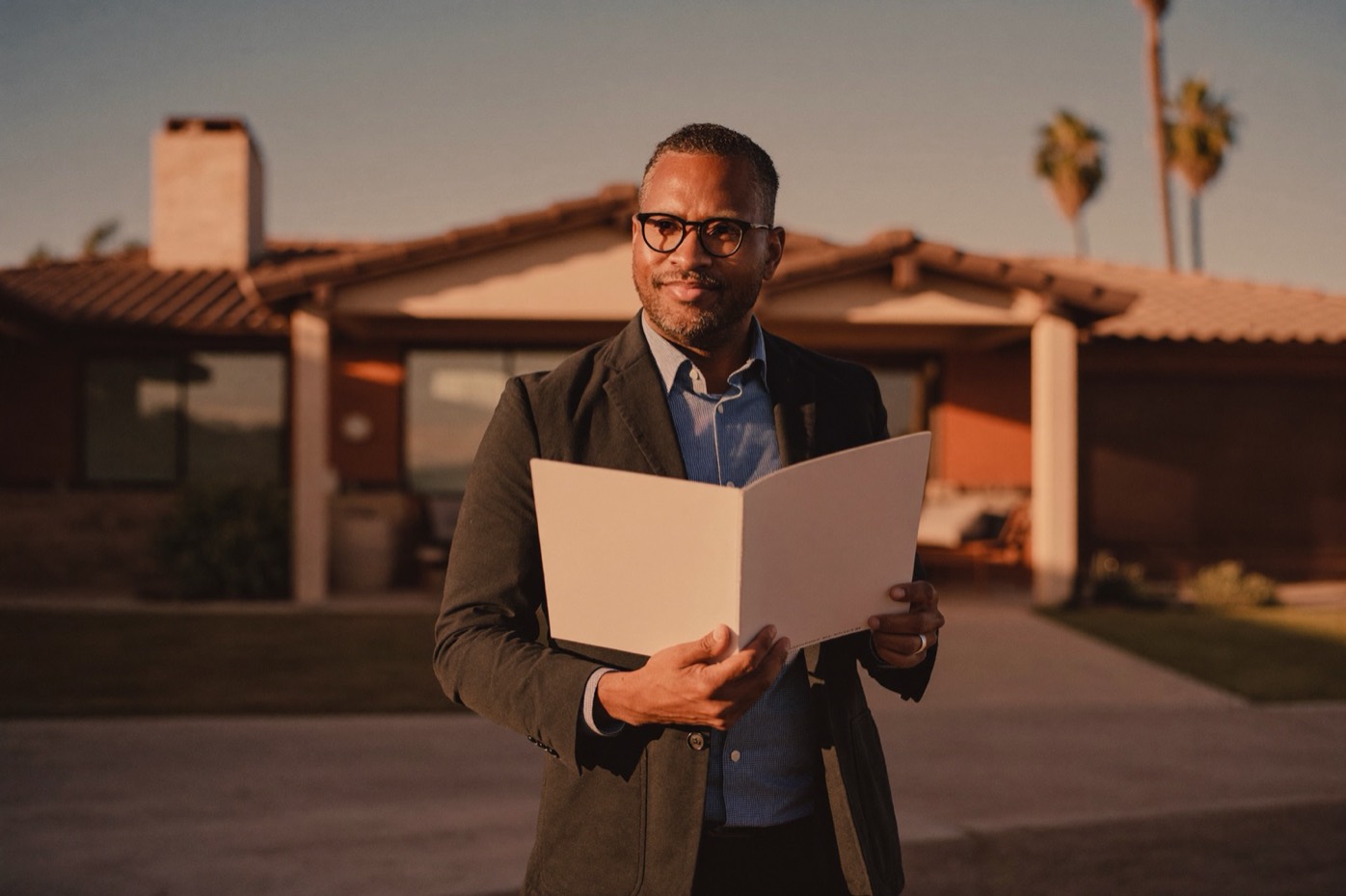 An experienced agent outside a California property