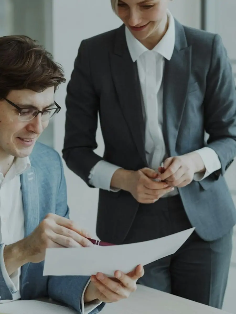 A team reviewing sales numbers at a table